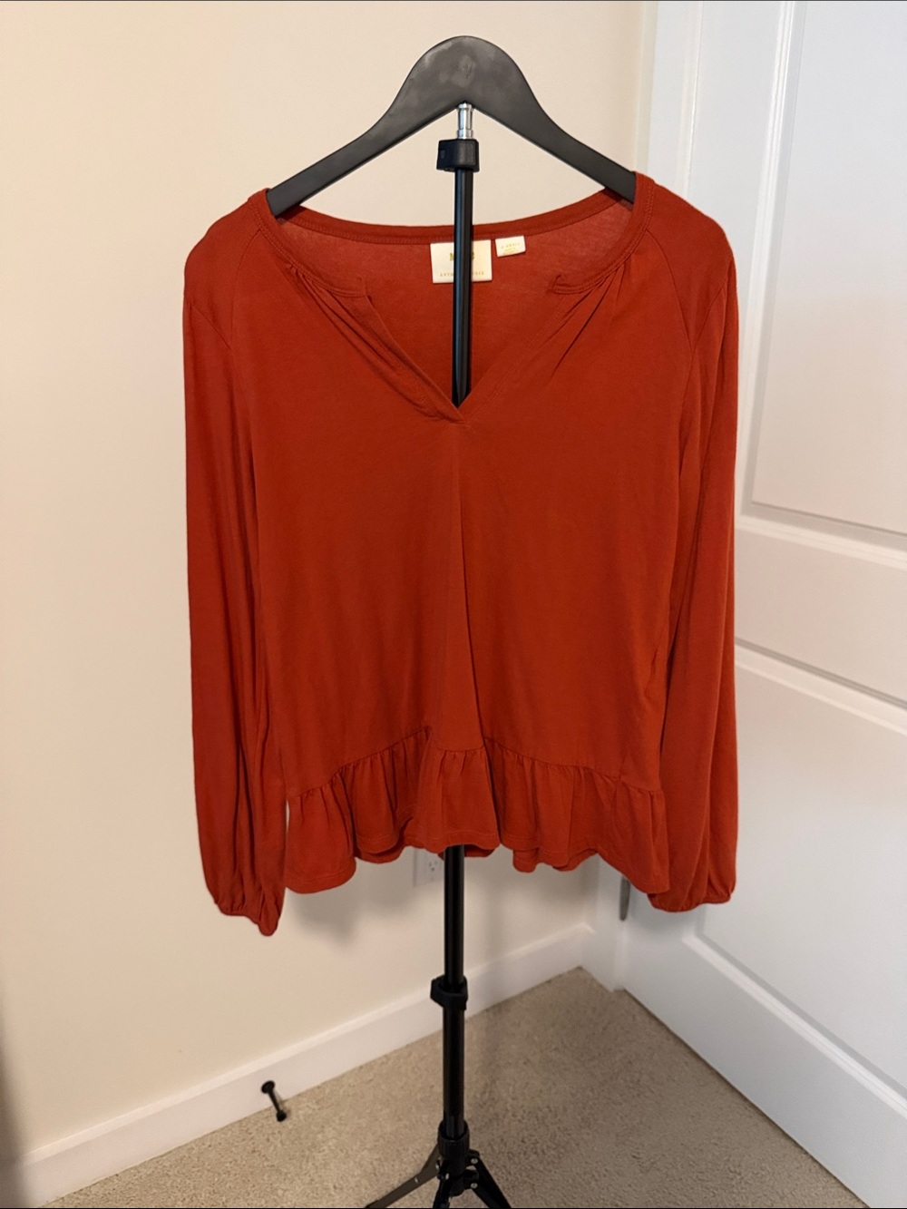 Anthropologie Rust V-Neck Long Sleeve Ruffle-Hem Top